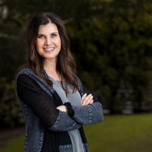 A picture of Janelle Bruland, author of The Success Lie: 5 Simple Truths to Overcome Overwhelm and Achieve Peace of Mind